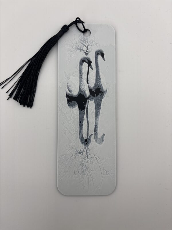 3D printed monochrome swan bookmark with decorative tassel on white background