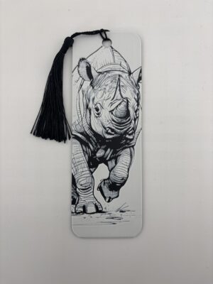 3D printed monochrome rhino bookmark with tassel on white background