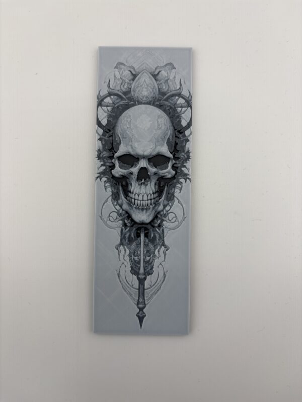 3D printed monochrome gothic skull bookmark with ornate symmetrical design