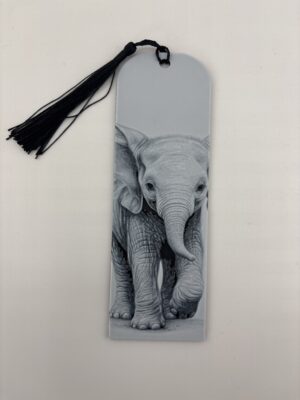 3D printed monochrome elephant bookmark with tassel on white background