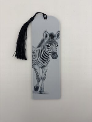 3D printed monochrome zebra bookmark with tassel on white background