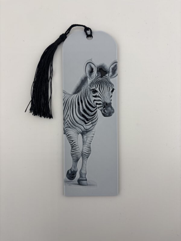 3D printed monochrome zebra bookmark with tassel on white background 3D printed monochrome zebra bookmark with tassel on white background