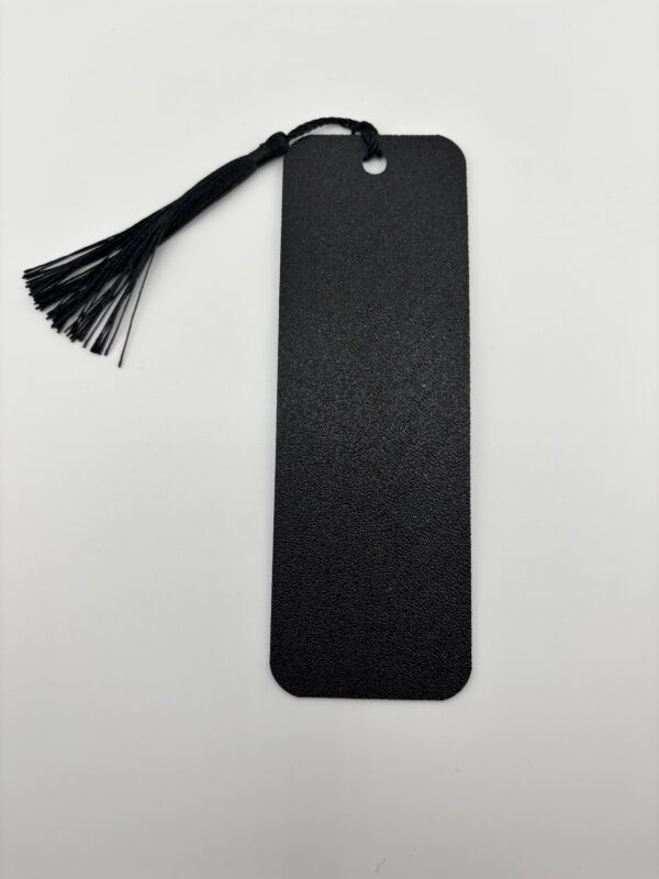 Back side of 3D printed PLA fox bookmark showing textured black finish