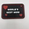 Close-up of textured 3D printed World’s Best Mum magnet with heart design