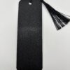 Back side of 3D printed PLA bookmark with textured black finish and decorative tassel