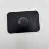 Back of 3D printed fridge magnet showing strong round magnet backing Back of 3D printed fridge magnet showing strong round magnet backing